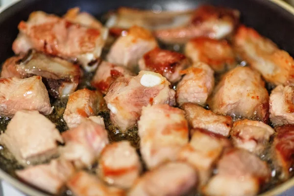 Pork on frying pan — Stock Photo, Image