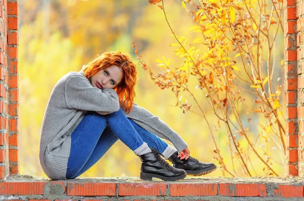 Wistful Woman Sweater Sitting Brickwork Autumn Day Shallow Dof — Stock Photo, Image