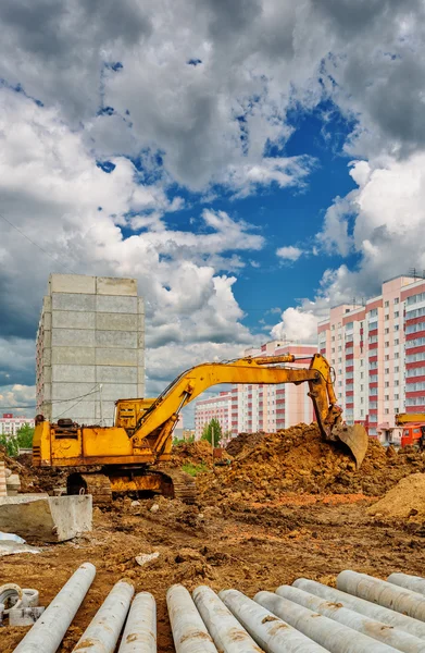 Excavadora en el sitio de construcción — Foto de Stock
