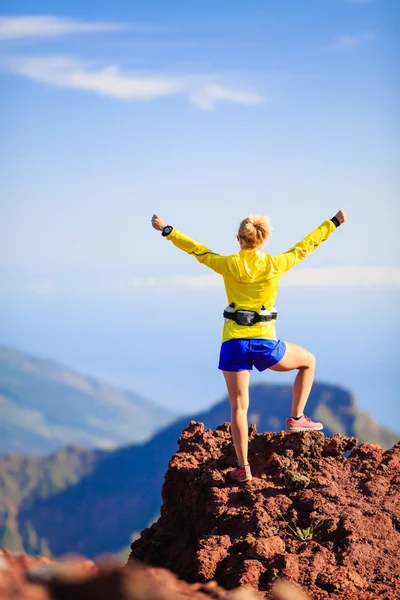 Climbing success, woman cross country runner — Stock Photo, Image