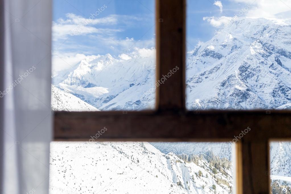 Looking through window at Himalaya Mountains