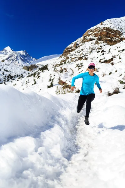 Cross country running in winter mountains — Stok fotoğraf