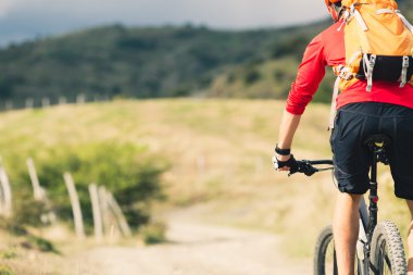 Mountain biker riding MTB