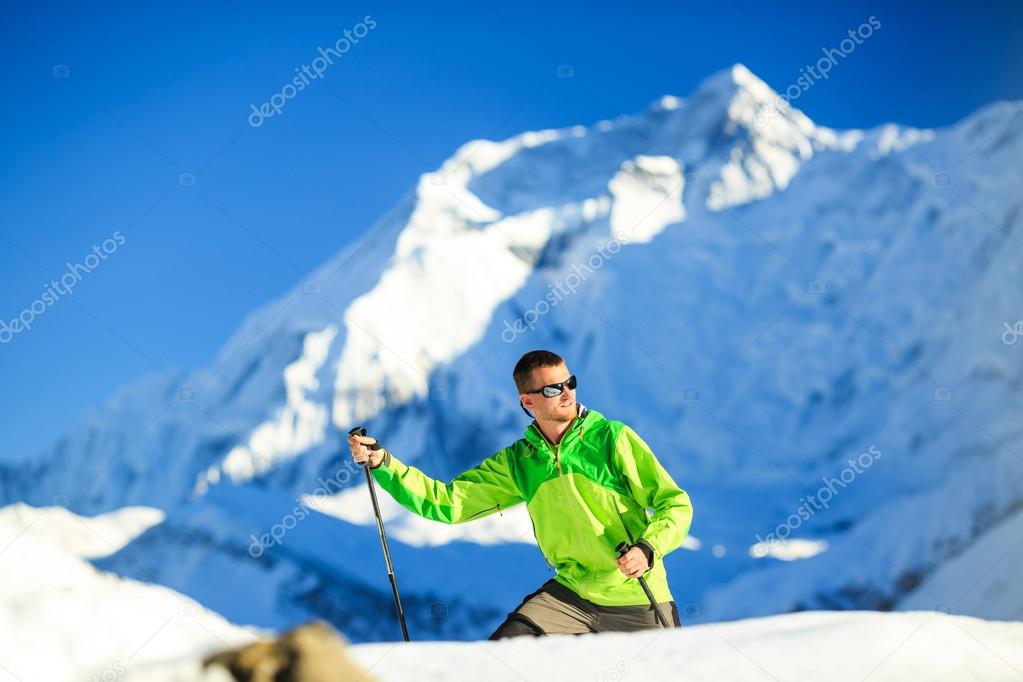 Man hiking in Himalaya Mountains in Nepal