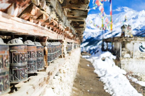 Prayer wheels in high Himalaya Mountains, Nepal village