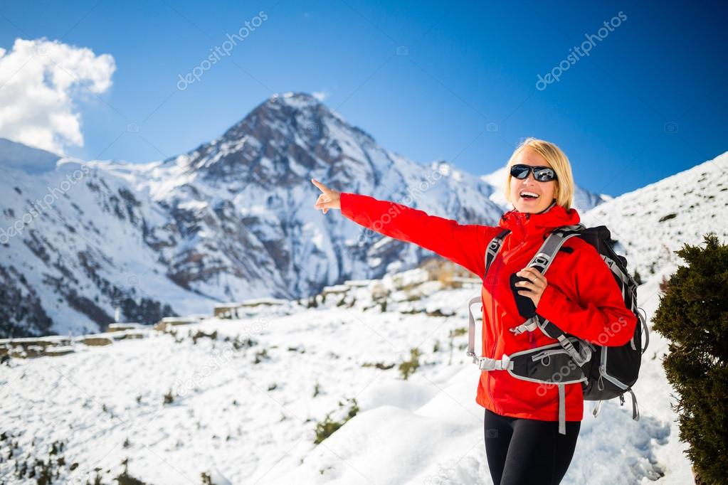 Woman hiker happy walking in Himalaya Mountains, Nepal