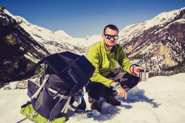 Man camping and hiking in Himalaya Mountain pass in Nepal