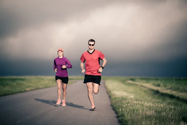 People running training on country road — Stock Photo, Image