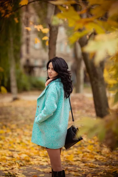 Beautiful girl in autumn garden — Zdjęcie stockowe