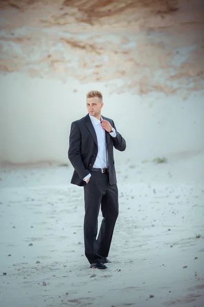 Young businessman in black suit — Stock Photo, Image