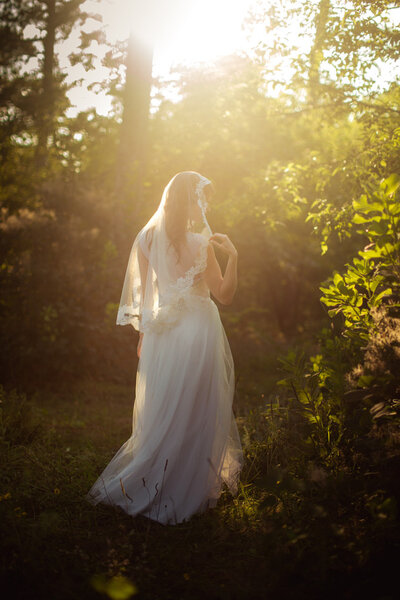 Bride in white dress in the garden