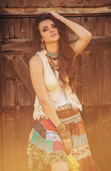 Woman posing in bright ethnic clothes — Stock Photo, Image