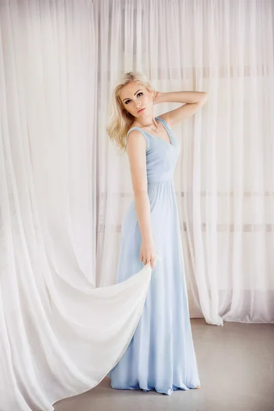 Blonde woman in fashion dress — Stock Photo, Image