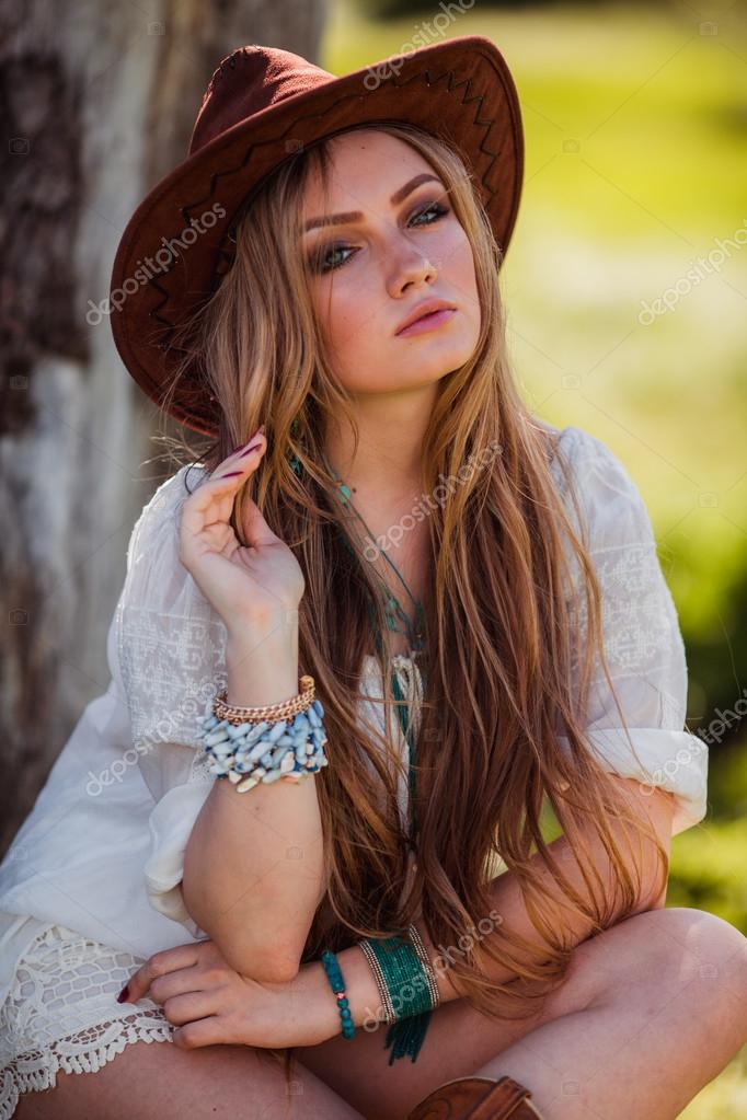 Bohemian girl in hat outdoors Stock Photo by ©Forewer 116533362