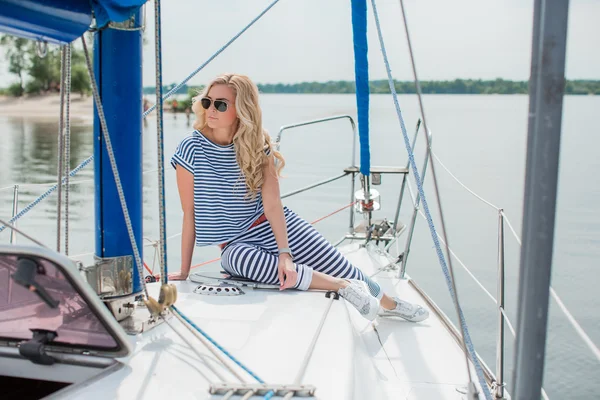 Woman on her private yacht — Stock Photo, Image