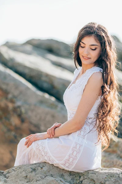 Young woman in white dress outdoors — Stock Photo, Image