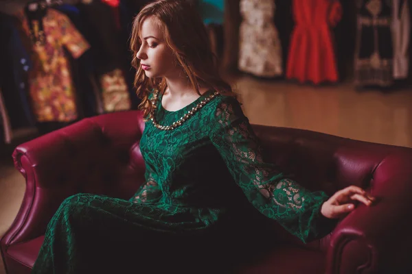 Woman with makeup in green dress — Stock Photo, Image