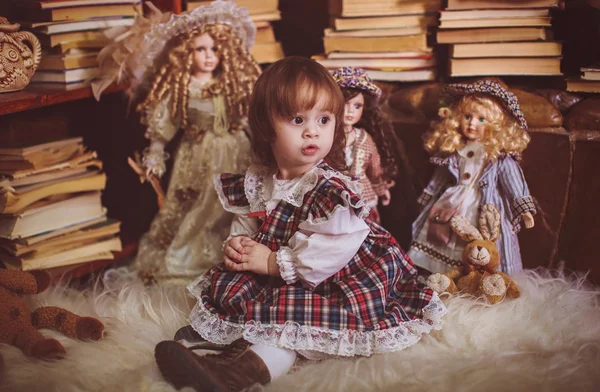 Little lady with dolls — Stock Photo, Image