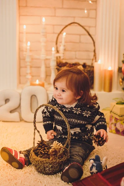 Baby girl with gifts — Stock Photo, Image