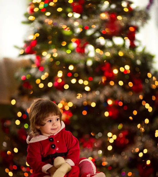 Little girl in Santa Claus clothes — Stock Photo, Image