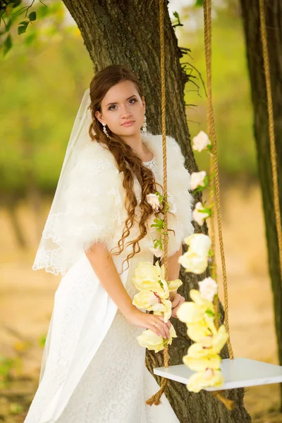 Beautiful bride in white dress — Stock Photo, Image