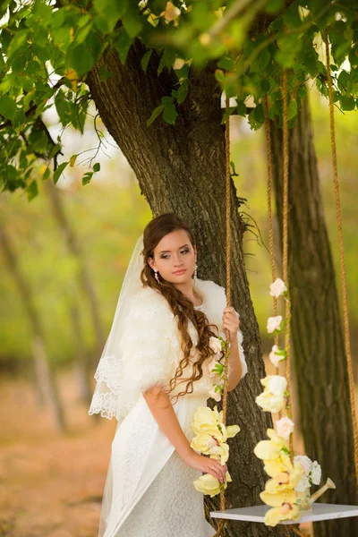 Beautiful bride in white dress — Stock Photo, Image