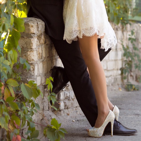 Legs newlyweds in wedding day