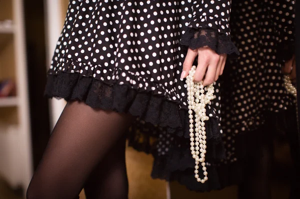 Woman's hand with pearls — Stock Photo, Image