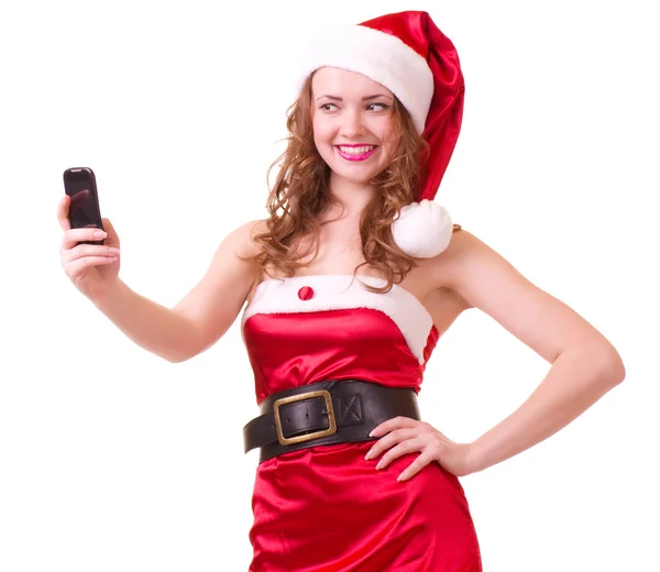 Женщина в одежде Деда Мороза с телефоном — стоковое фото