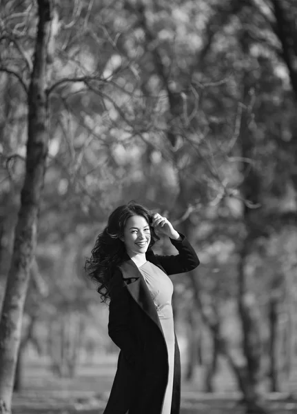 Beautiful girl in autumn garden — Stock Photo, Image