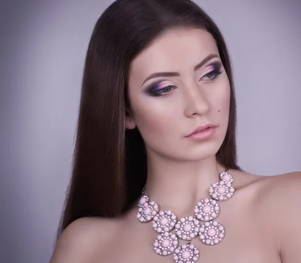 Woman with makeup and necklace — Stock Photo, Image