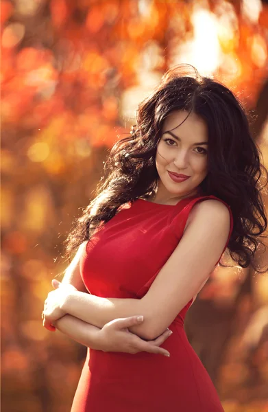 Beautiful girl in red dress — Stock Photo, Image