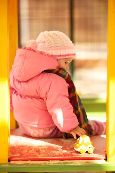 Baby girl in autumn garden — Stock Photo, Image