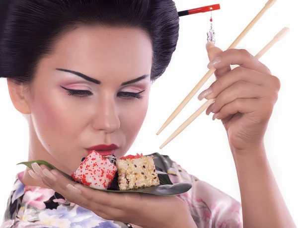 Mujer japonesa con sushi — Foto de Stock