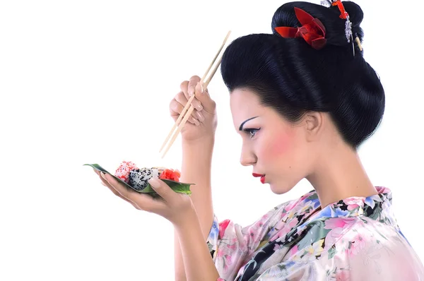 Japanese woman with sushi — Stock Photo, Image