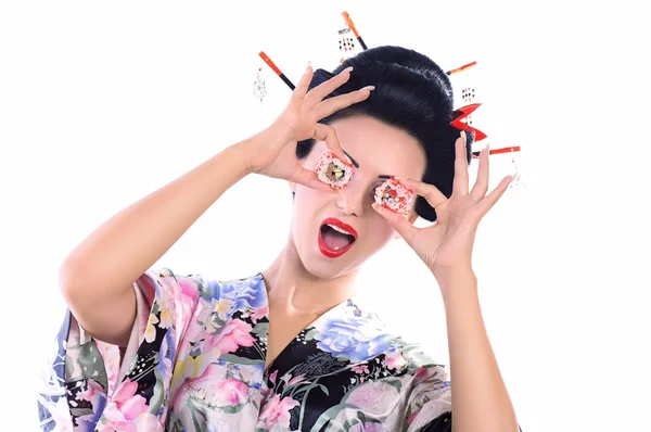 Japanese woman with sushi — Stock Photo, Image