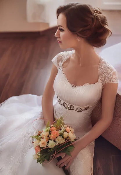 Bride holding bridal bouquet — Stock Photo, Image