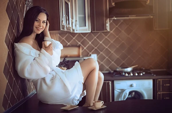 Mujer sexy con café en la cocina —  Fotos de Stock