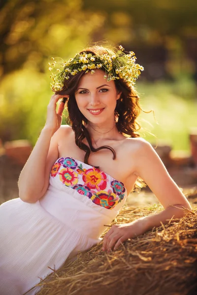 Portrait of beautiful woman in wreath — Stock Photo, Image