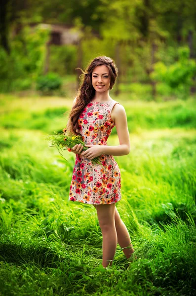 Young woman in spring garden Royalty Free Stock Images