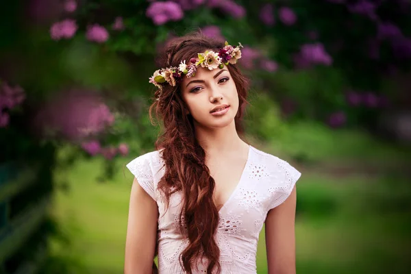 Woman in spring garden — Stock Photo, Image