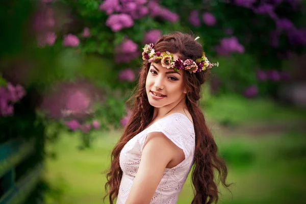 Woman in spring garden — Stock Photo, Image