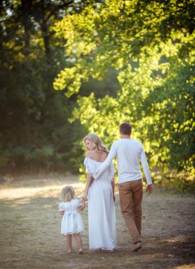 kadın kocası ve genç kızı ile