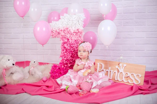 Princess baby girl with donuts — Stock Photo, Image