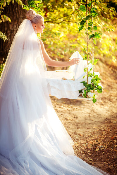 Beautiful bride in park