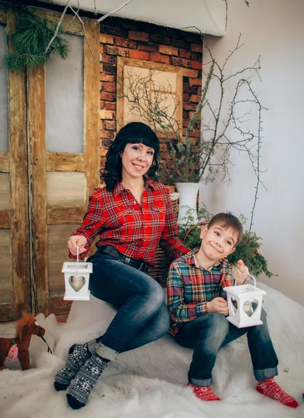 Mother and son at Christmas eve — Stock Photo, Image