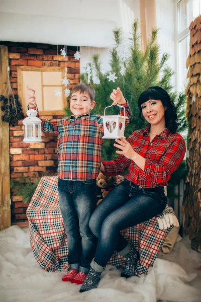 Mother and son at Christmas eve — Stock Photo, Image