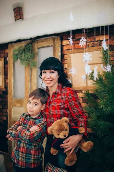 Mother and son at Christmas eve — Stock Photo, Image