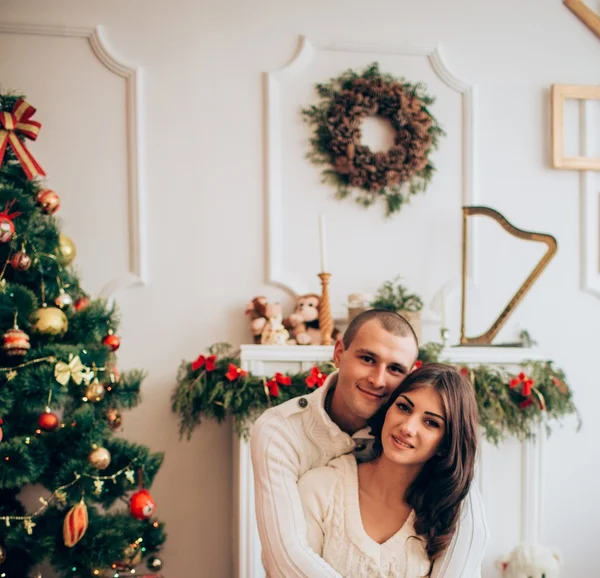 Beautiful couple at Christmas eve — Stock Photo, Image