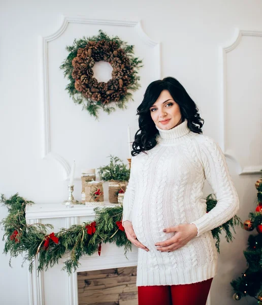 Pregnant Woman at Christmas eve — Stock Photo, Image